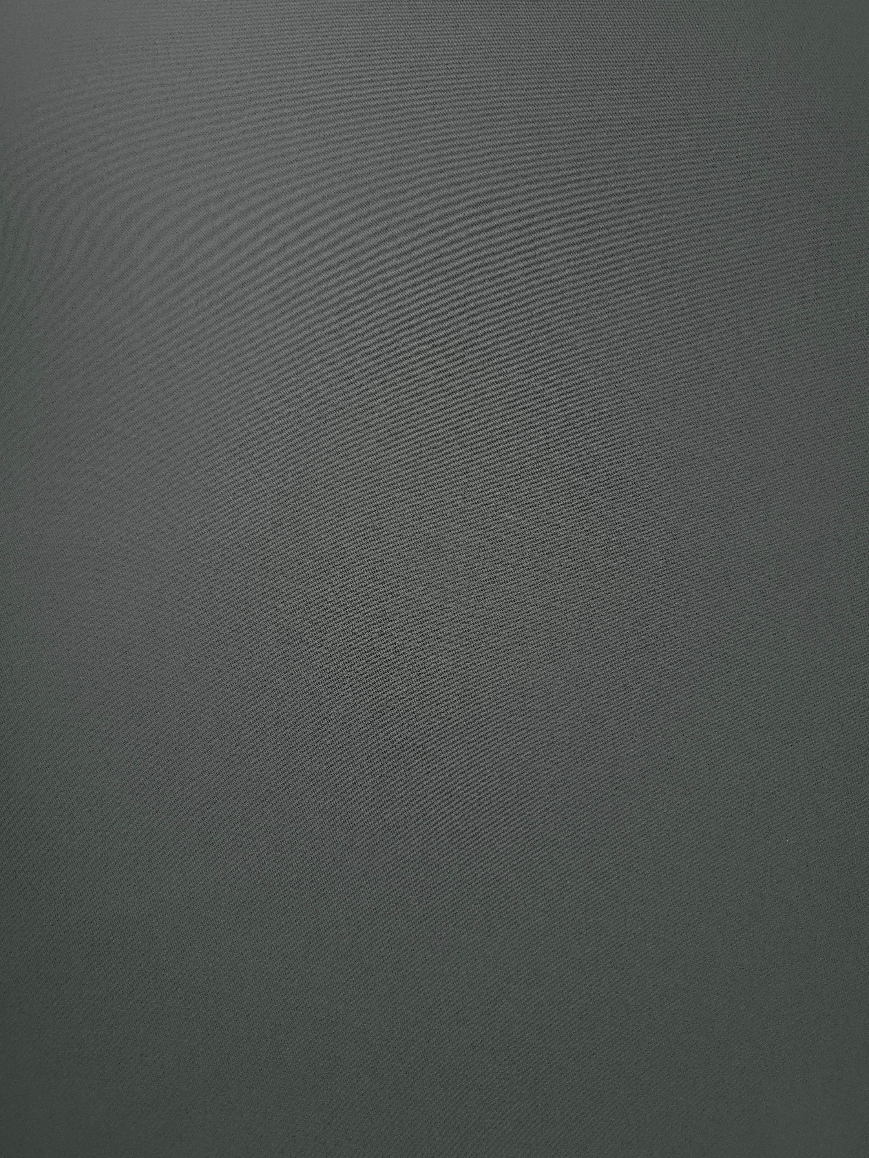 Graphite Gray Italian polyester crepe shown flat, smooth woven apparel fabric with a soft silky-feel finish