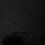 Jet Black shimmer stretch fabric close-up, revealing metallic foil texture and reflective detail for fashion and costume sewing