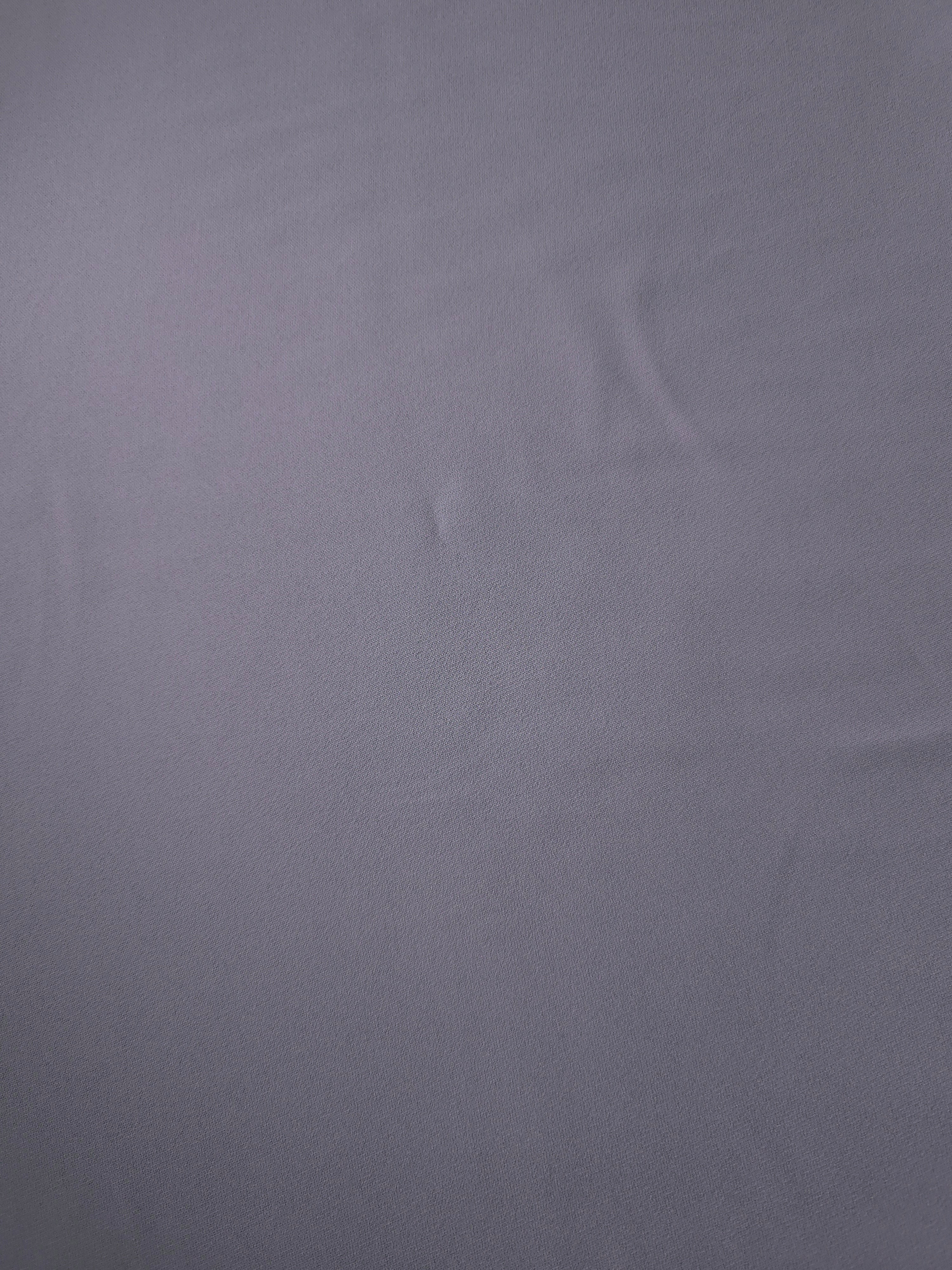 Lavender Gray Italian polyester crepe shown flat, smooth woven apparel fabric with a soft silky-feel finish