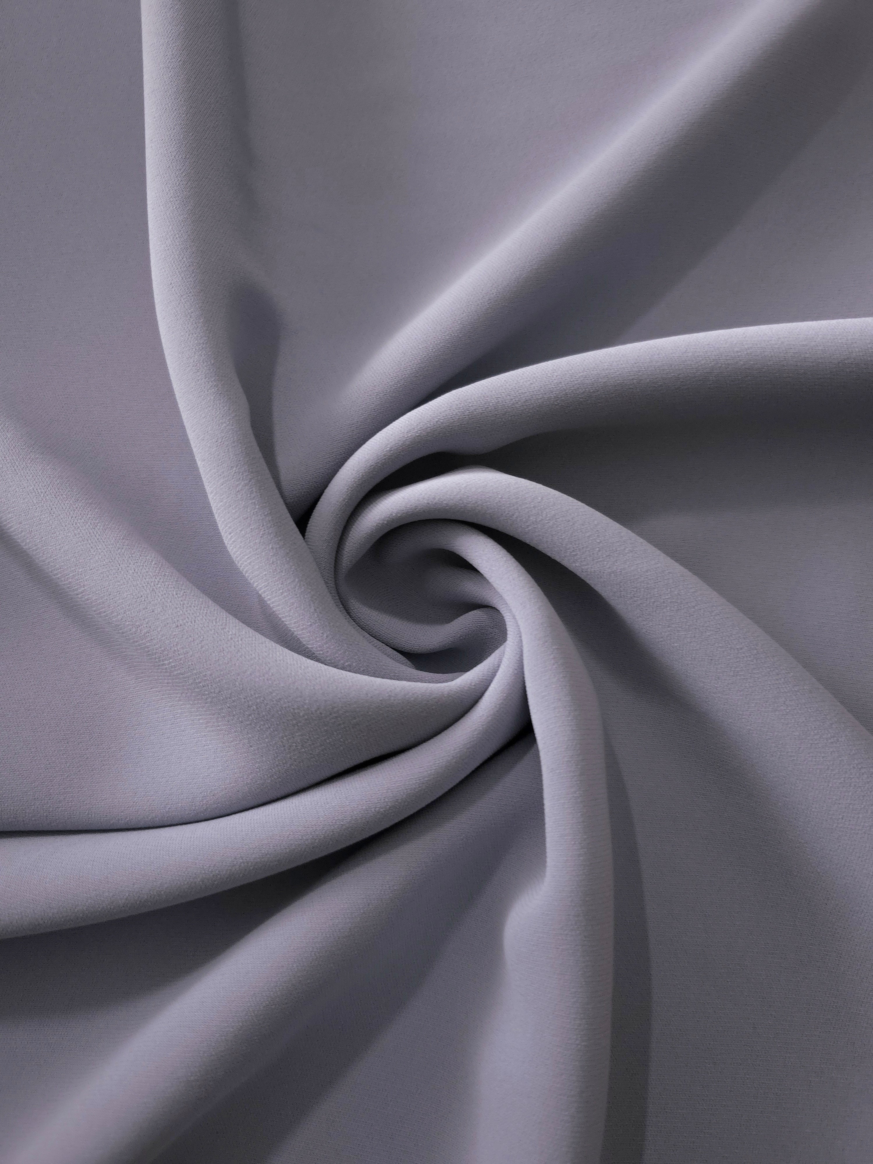 Lavender Gray silky-feel polyester crepe styled in a swirl, showing graceful drape for modest fashion