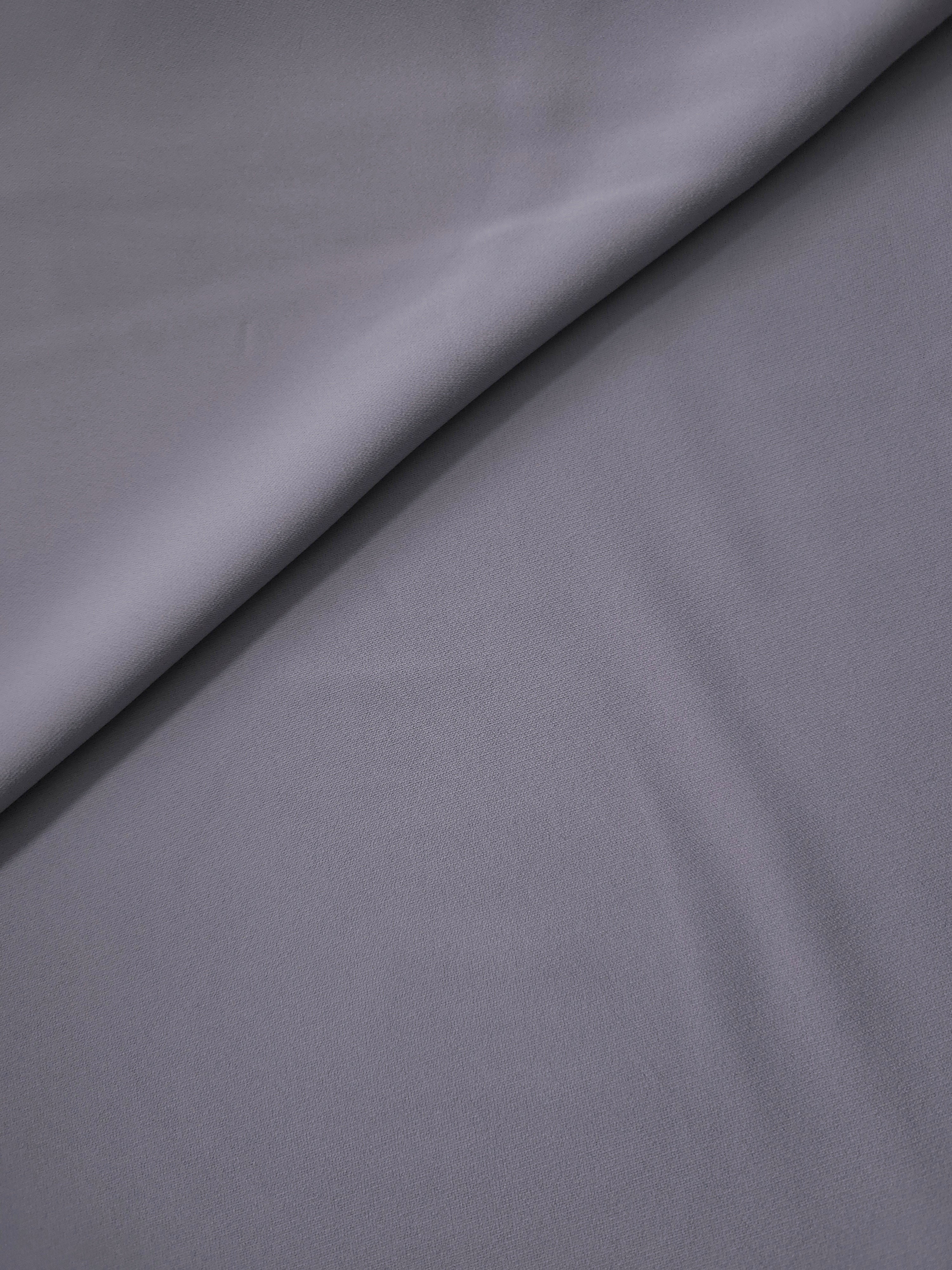 Lavender Gray Italian crepe in a soft fold, showing fluid drape for blouses, dresses and flowing skirts