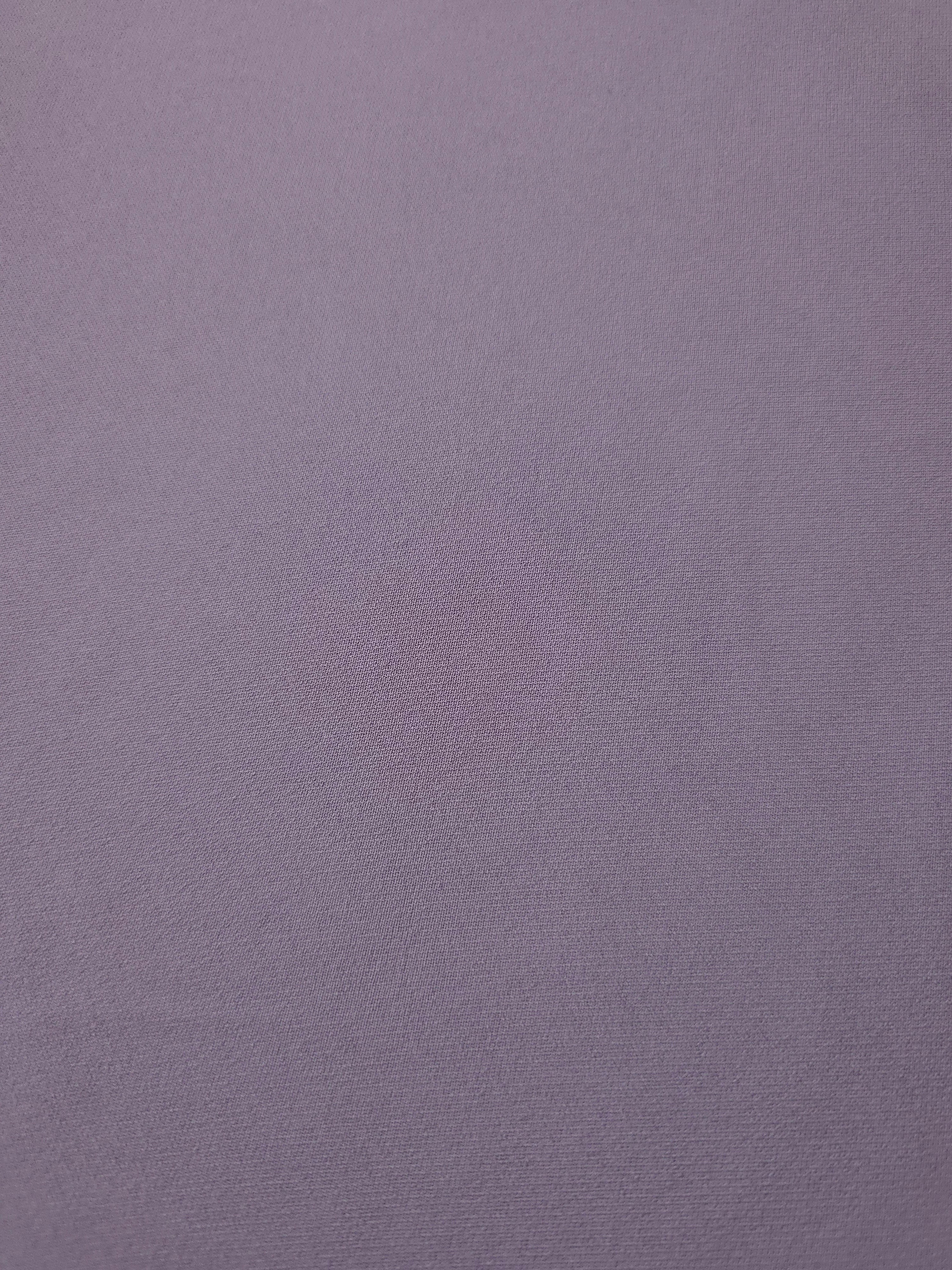 Fine texture close-up of Mauve Gray mechanical polyester crepe showing a smooth, silky-soft woven hand