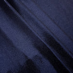 Midnight Navy Blue metallic foiled spandex in layered folds, highlighting reflective texture and flexible structure for stage and eveningwear