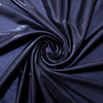 Swirled Midnight Navy Blue metallic foiled spandex showing fluid movement and luminous sheen for dresses, dancewear and stage costumes