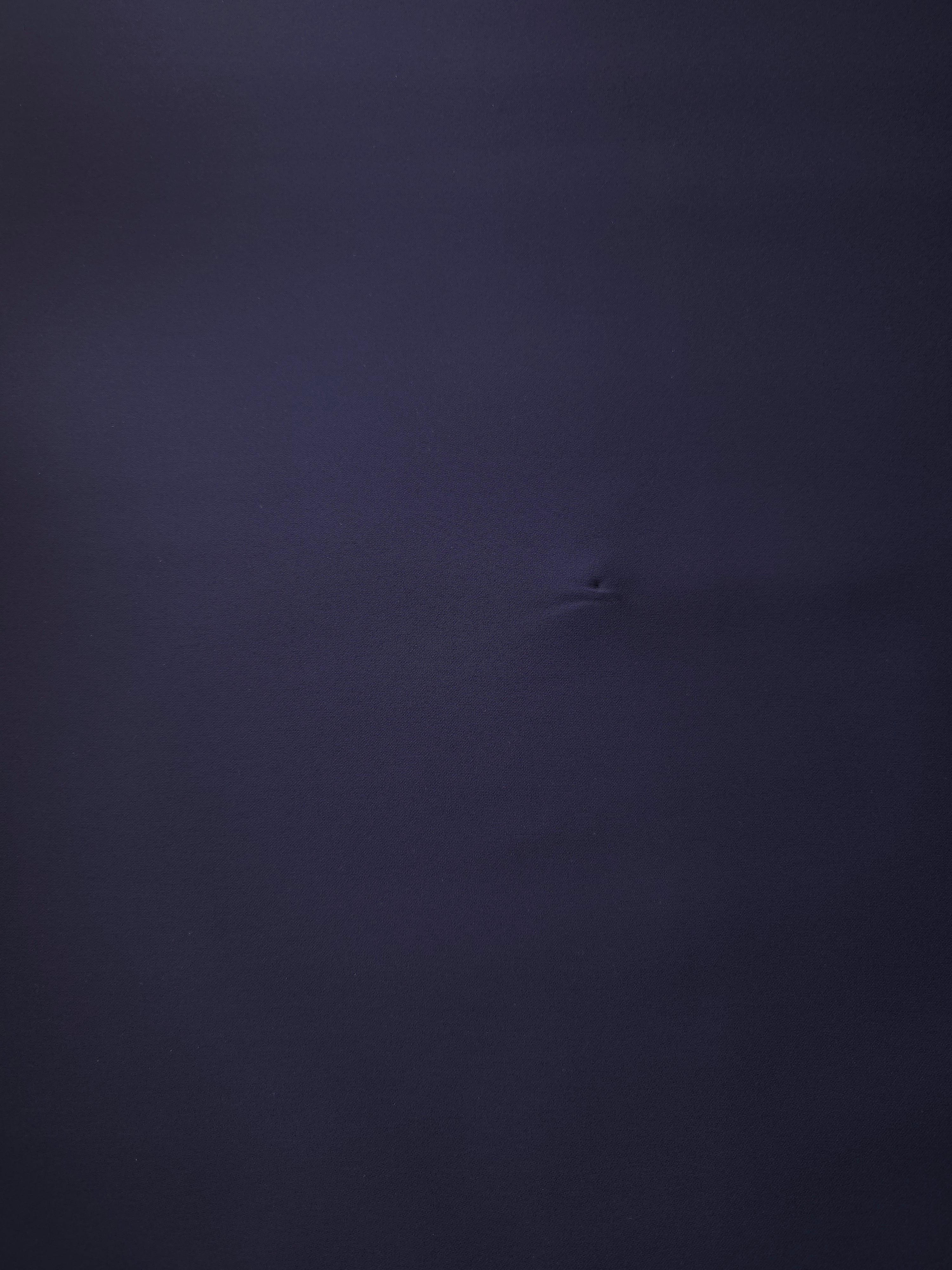 Midnight Navy Purple Italian polyester crepe shown flat, smooth woven apparel fabric with a soft silky-feel finish