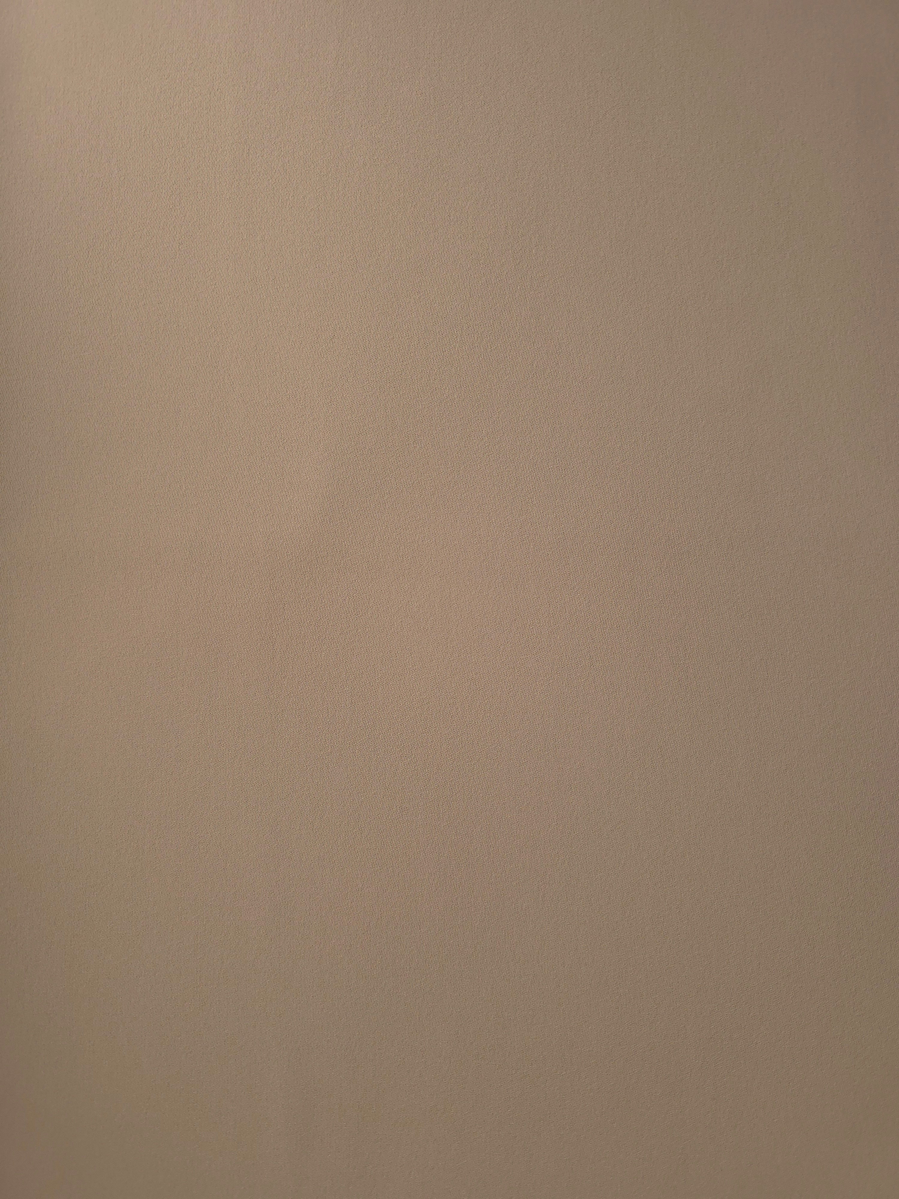 Flat view of Mocha Taupe Italian crepe, smooth polyester dressmaking fabric with a refined silky-feel surface