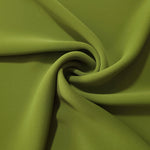 Moss Green opaque polyester crepe in a spiral drape, showing flowing form for skirts and modest garments