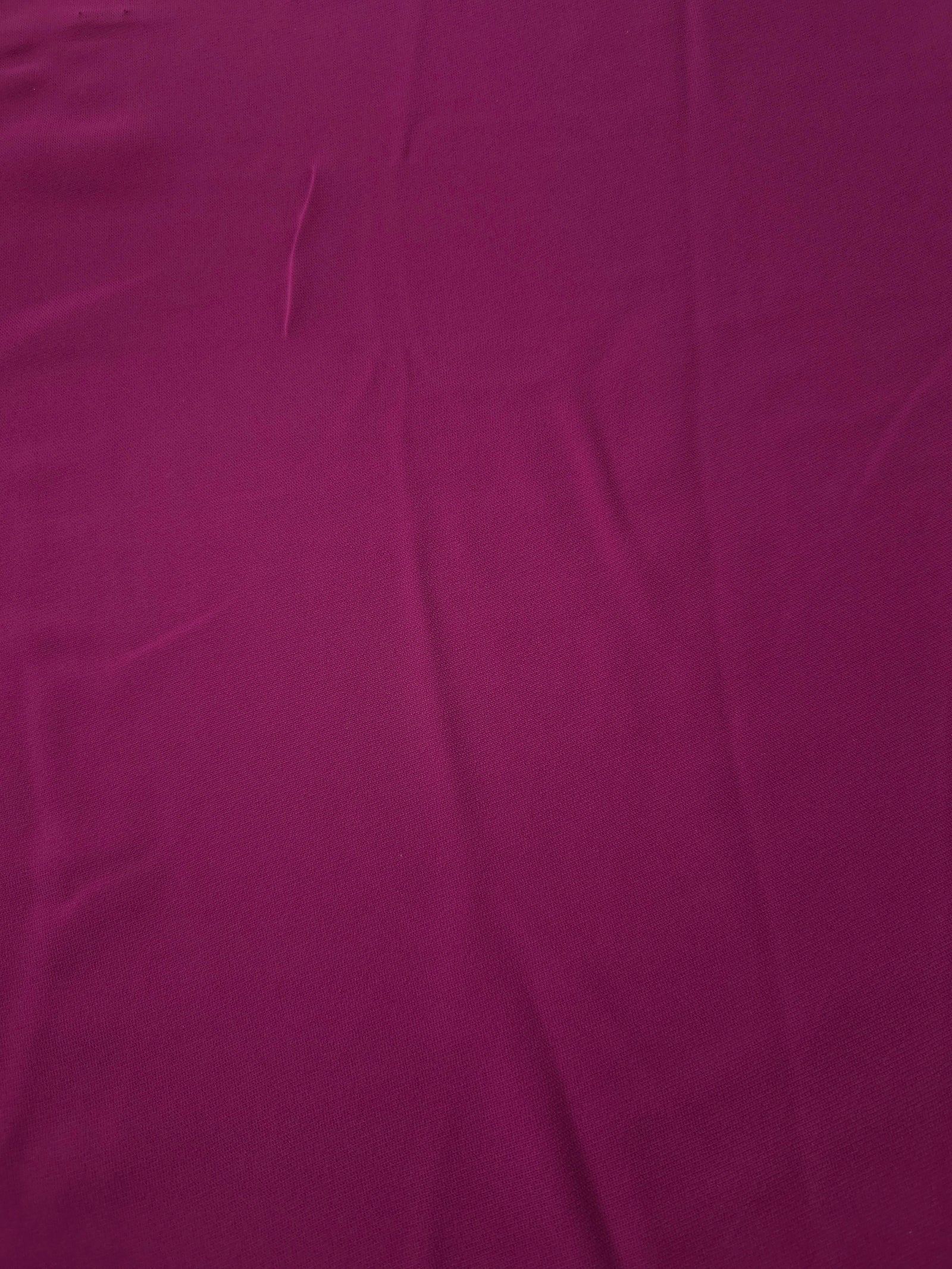 Mulberry Purple 205 GSM Korean polyester crepe shown flat, an opaque woven dress fabric with a silky-soft finish