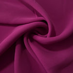 Mulberry Purple polyester crepe arranged in a flowing swirl, showing drape used for abayas and modest fashion