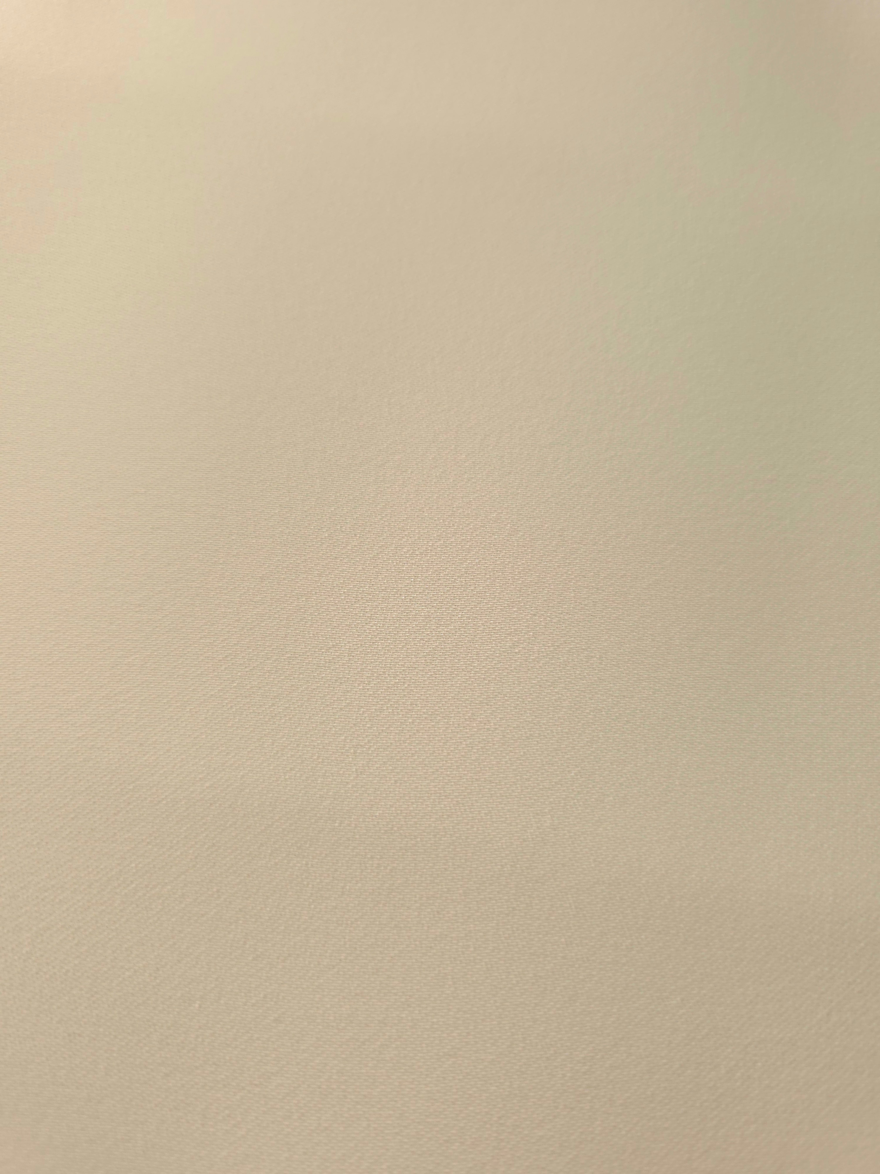 Oatmeal Beige crepe texture close-up showing fine mechanical polyester weave and a smooth silky-soft hand