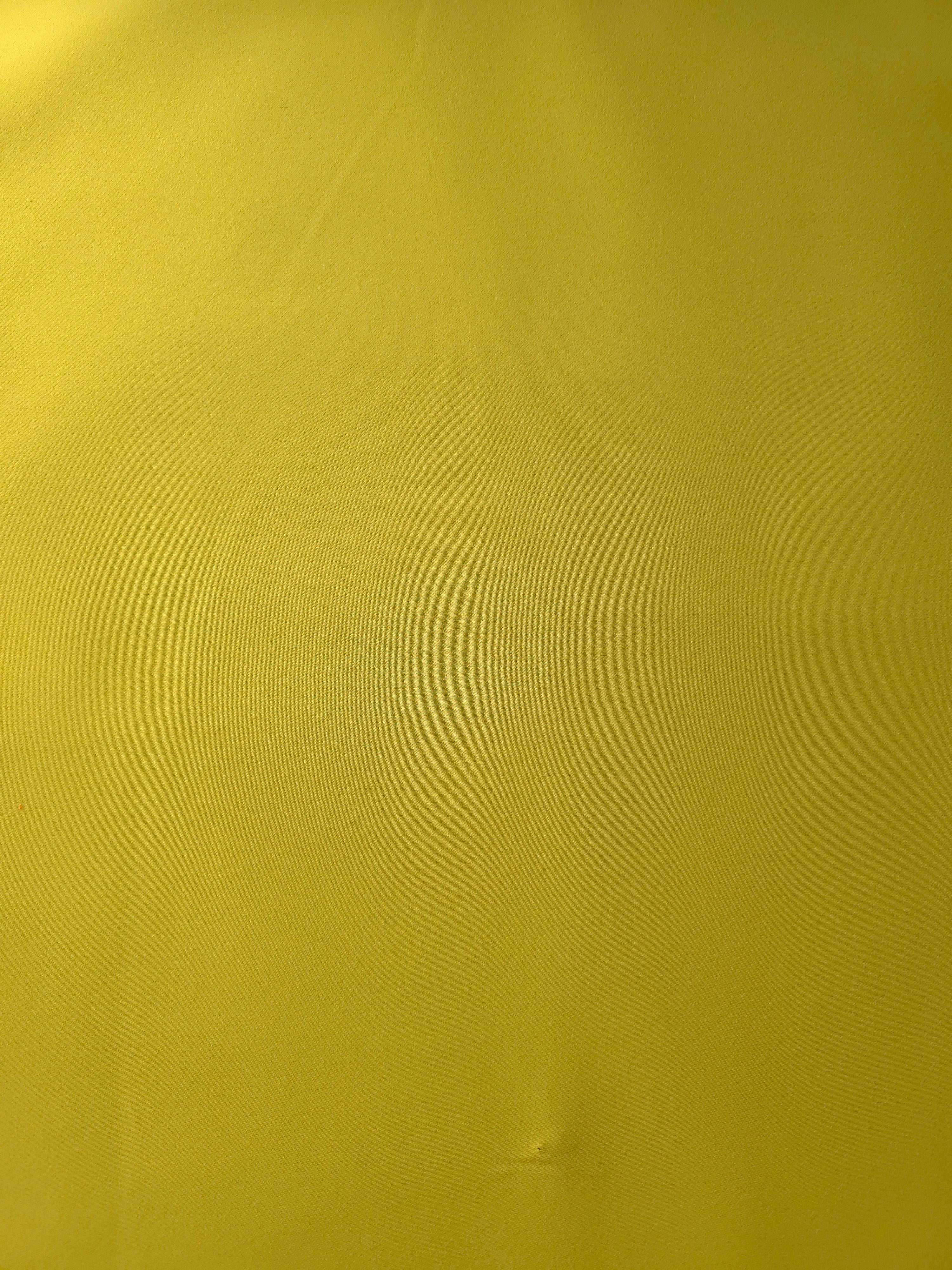 Olive Gold Italian polyester crepe shown flat, smooth woven apparel fabric with a soft silky-feel finish