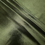 Olive Green shimmer spandex fabric stacked in soft layers, revealing metallic reflection for costumes, dresses and creative apparel