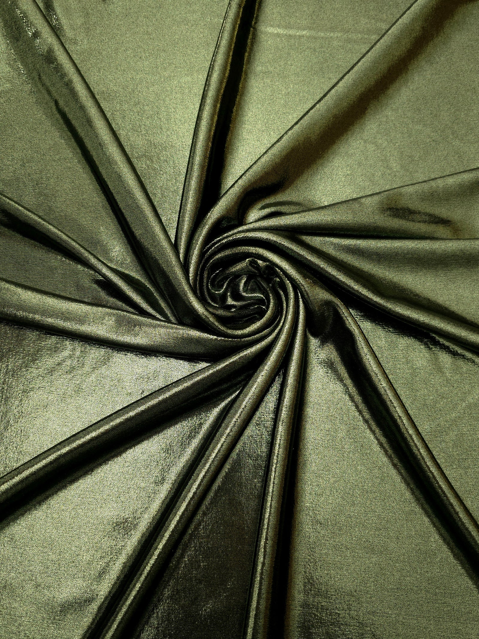 Spiraled Olive Green shimmer spandex fabric showing reflective movement for evening dresses, costumes and performance apparel