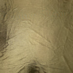 Full surface of Olive Khaki metallic stretch fabric, highlighting luminous foil sheen for stage costumes, dresses and fashion design