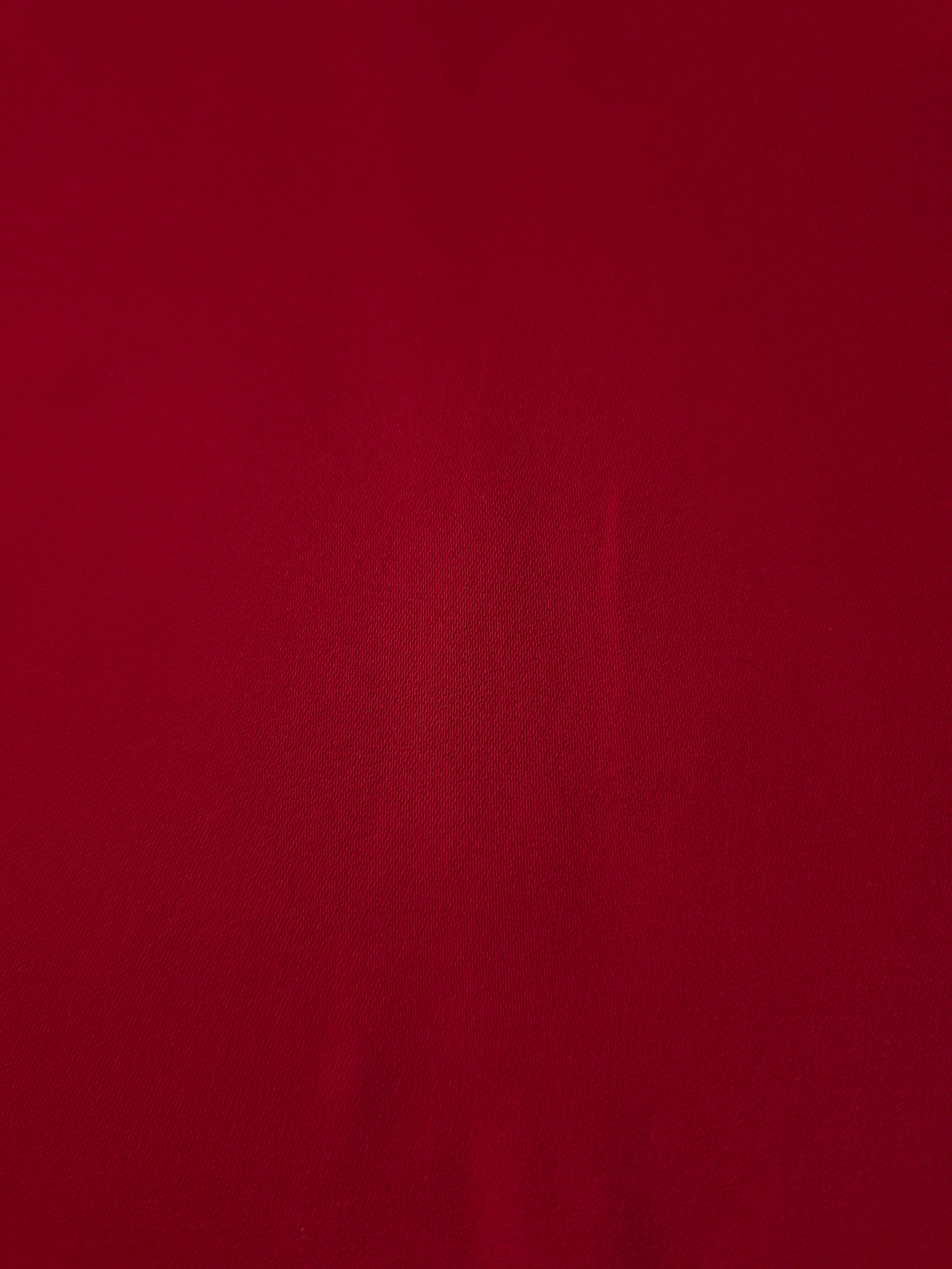 Oxblood Red Korean polyester crepe close-up showing the fine weave, smooth texture and silky-soft finish