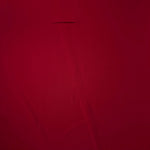 Flat view of Oxblood Red Korean polyester crepe, 205 GSM opaque dressmaking fabric with a smooth woven surface