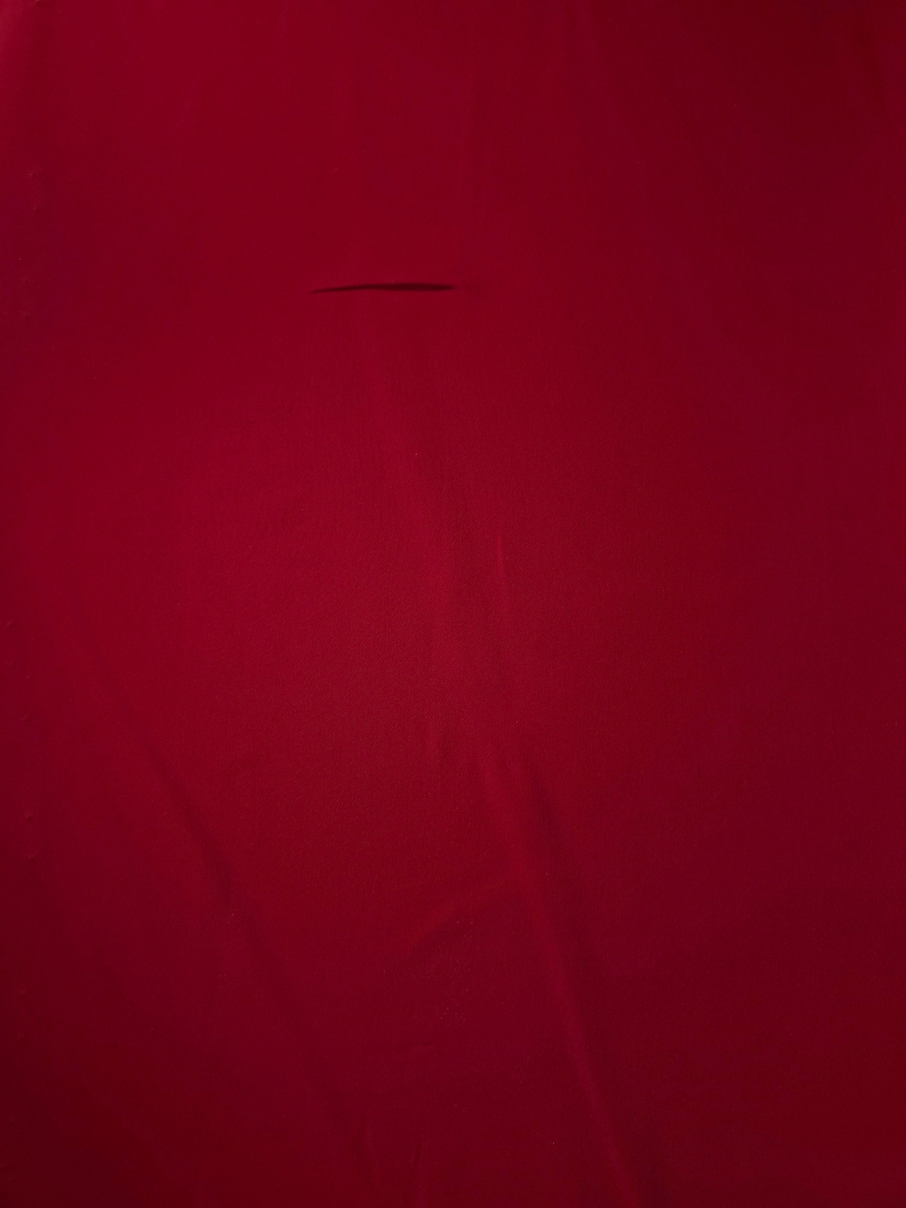 Flat view of Oxblood Red Korean polyester crepe, 205 GSM opaque dressmaking fabric with a smooth woven surface