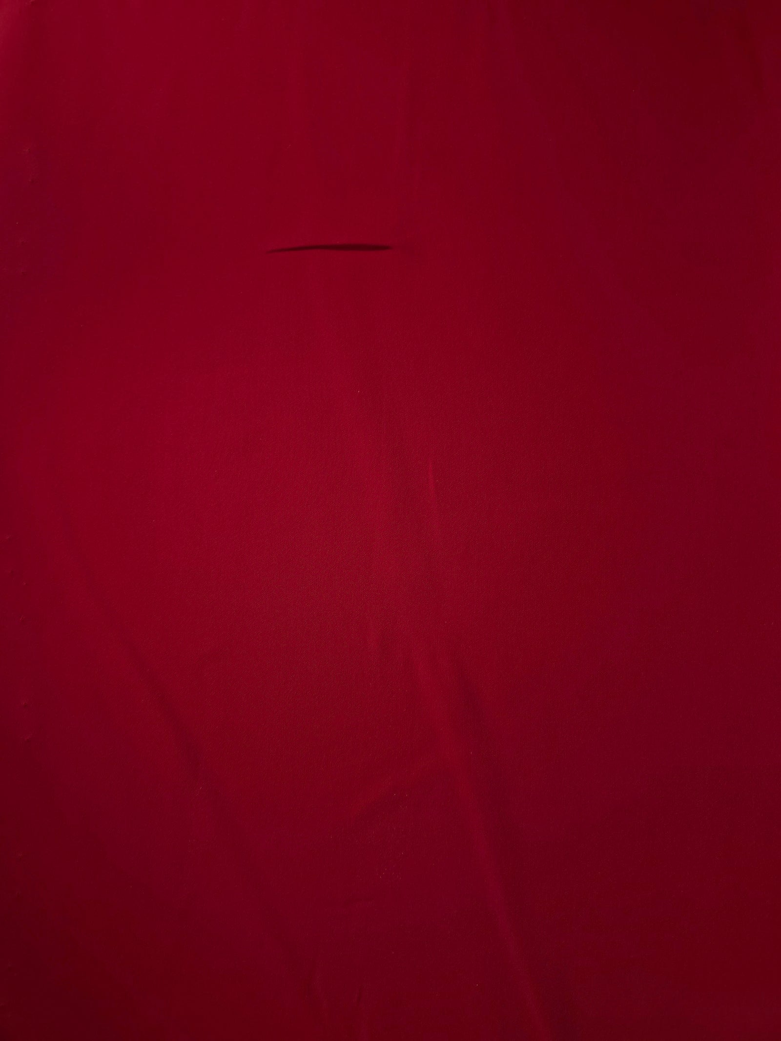 Flat view of Oxblood Red Korean polyester crepe, 205 GSM opaque dressmaking fabric with a smooth woven surface