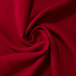 Swirled Oxblood Red Korean crepe showing fluid movement and silky drape for dresses and occasionwear