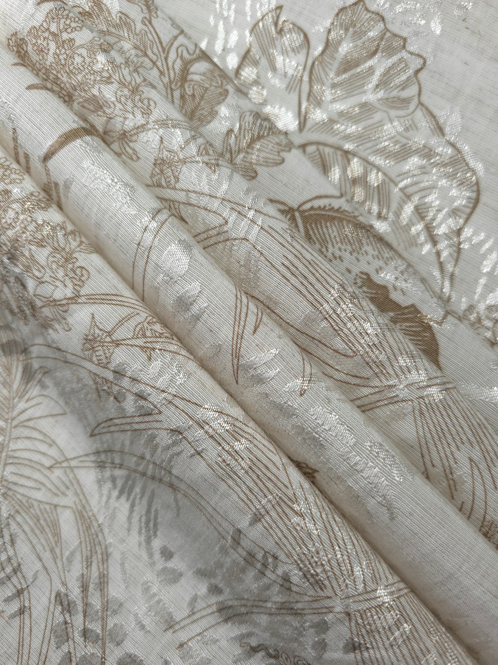 Reverse side of brown palm vine jacquard fabric showing woven construction and natural texture.