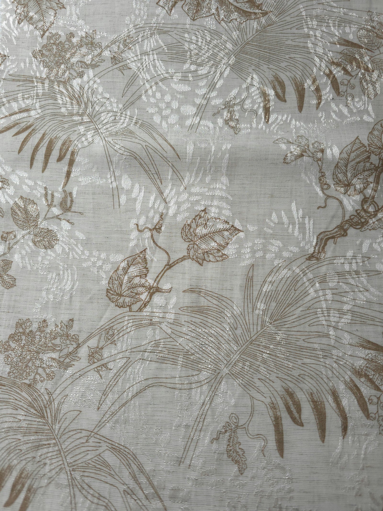 Brown palm vine linen-look jacquard fabric pattern overview with tonal botanical motif.