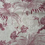 Texture view of deep red palm vine linen-look jacquard fabric with tonal leaf pattern.