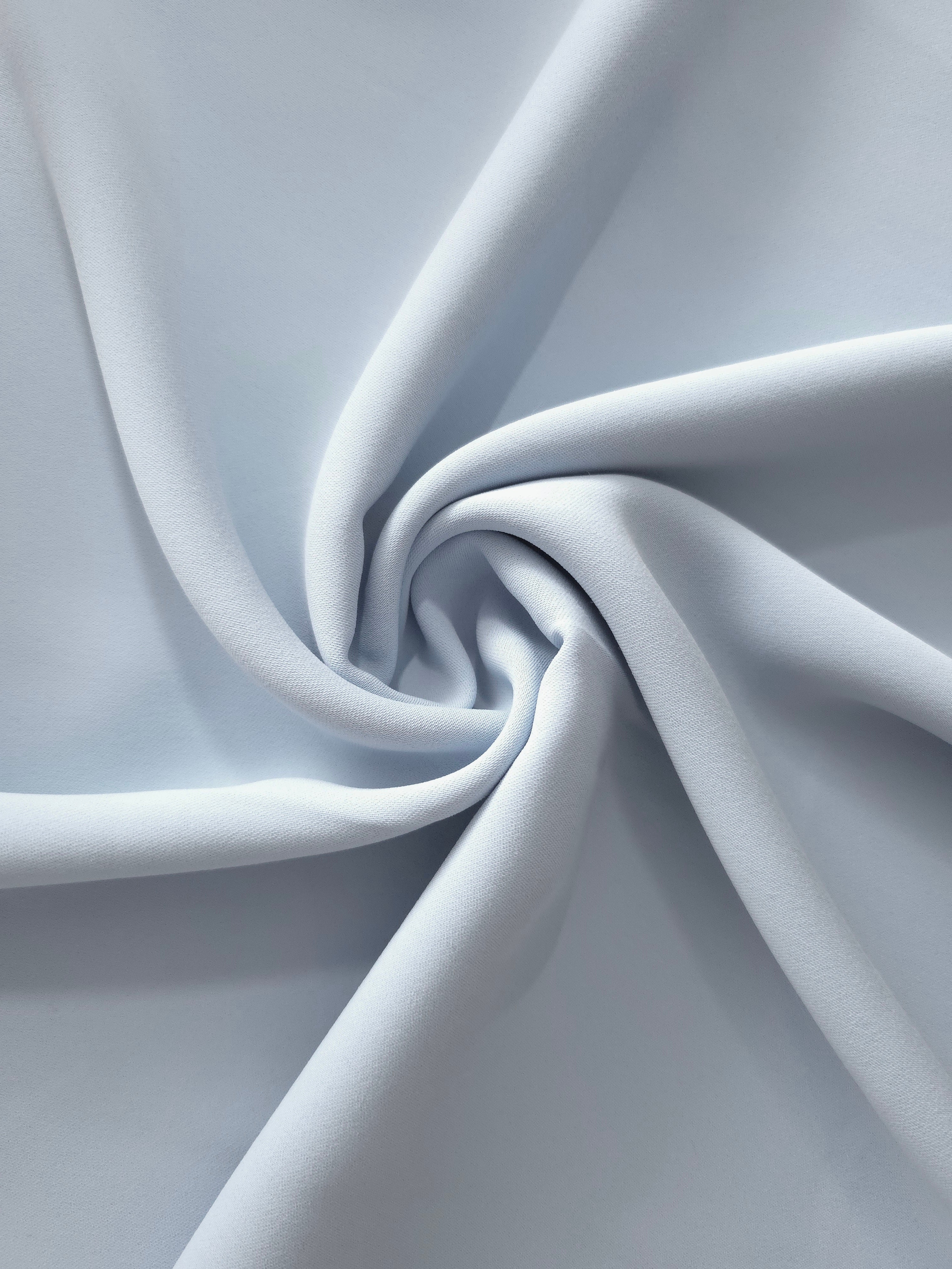 Pearl Blue Gray polyester crepe in a spiral drape for abayas, dresses and occasionwear