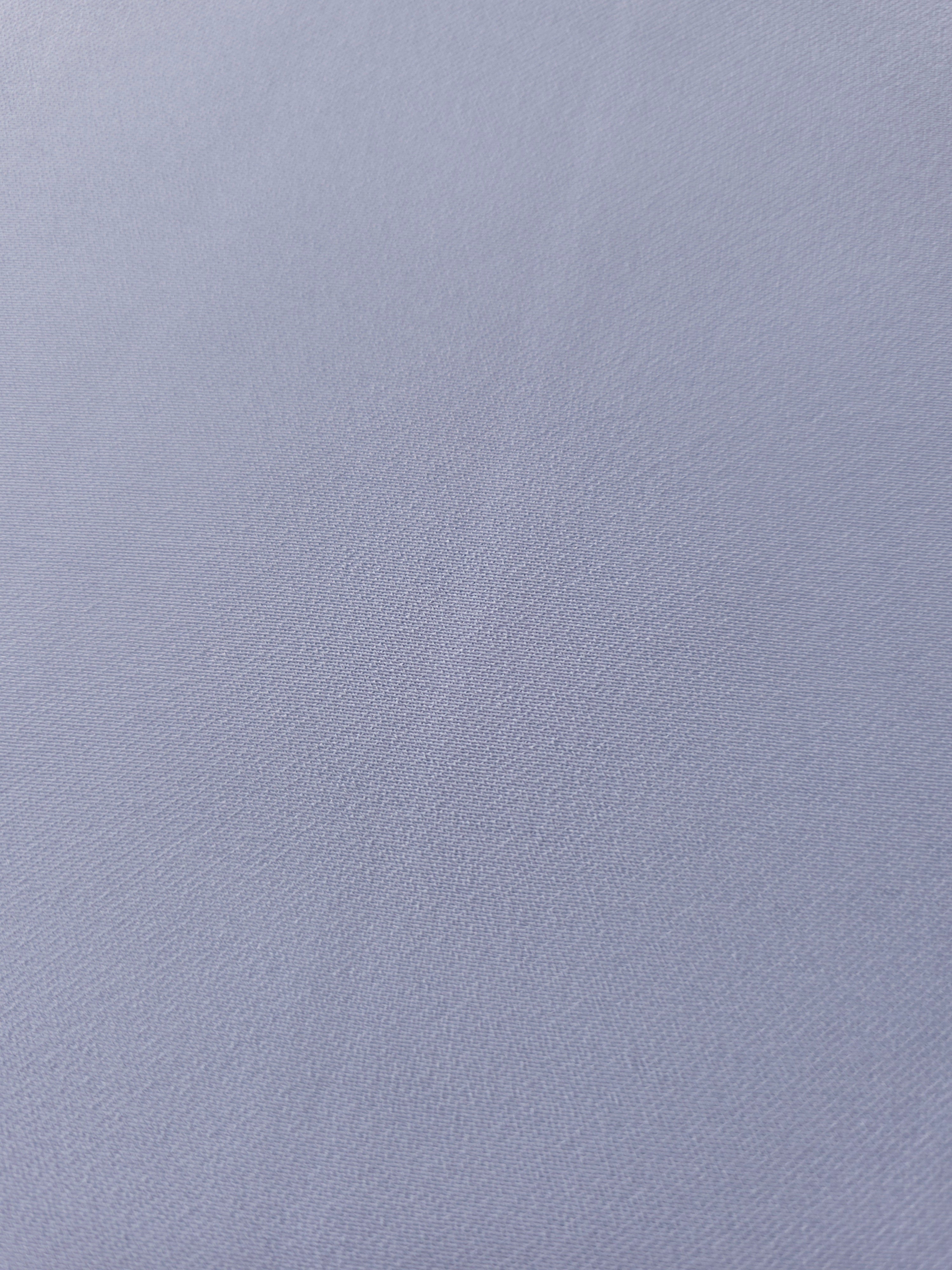 Periwinkle Blue mechanical polyester crepe in close-up, showing fine woven texture and a silky-soft surface