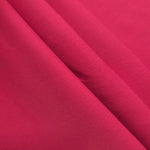 Raspberry Red mechanical polyester crepe layered to show soft structure for tailored garments and separates