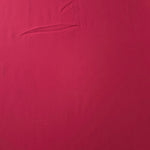 Surface view of Raspberry Red 205 GSM polyester crepe, opaque Korean dress fabric with a smooth woven finish