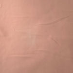 Rose Beige Korean polyester crepe in a flat surface view, 205 GSM opaque fabric for dresses and separates