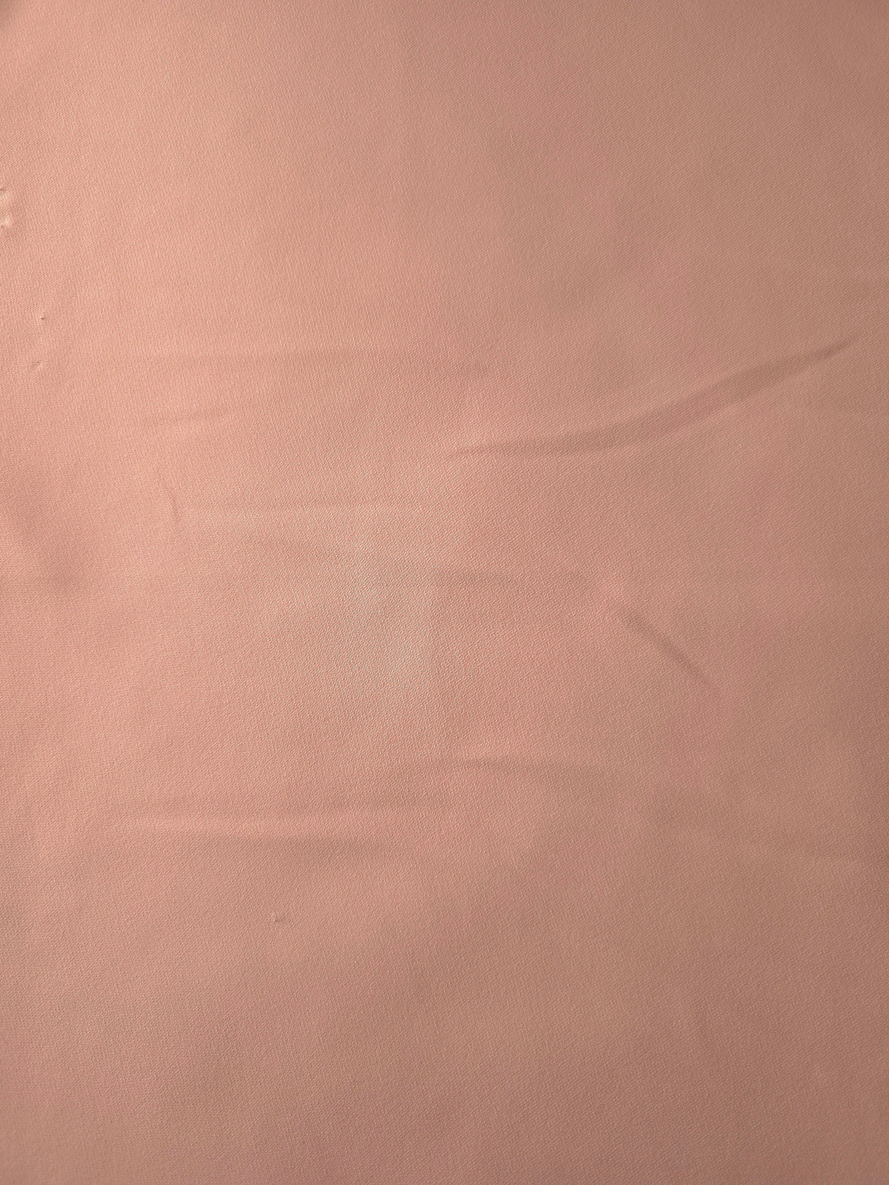 Rose Beige Korean polyester crepe in a flat surface view, 205 GSM opaque fabric for dresses and separates