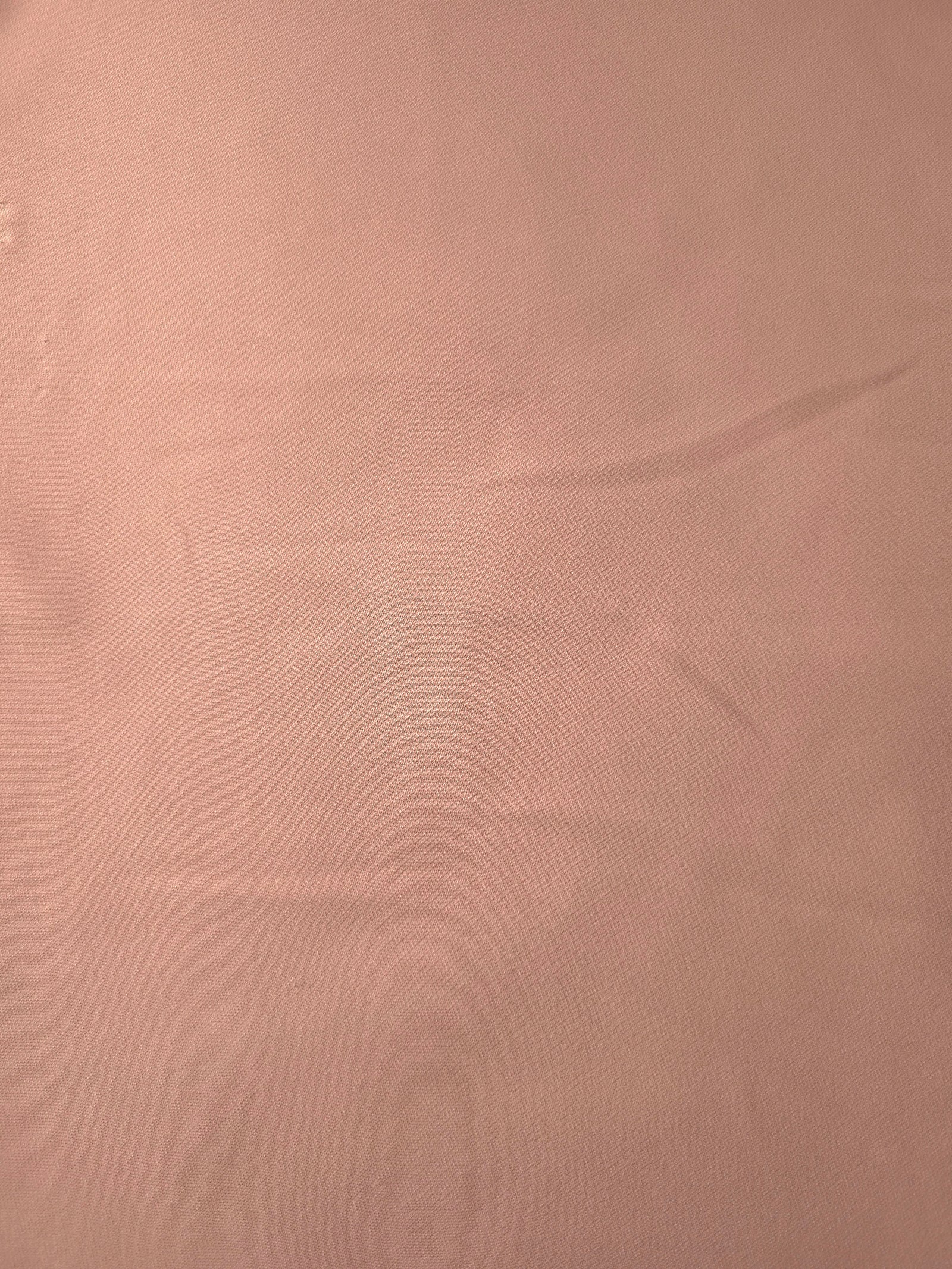 Rose Beige Korean polyester crepe in a flat surface view, 205 GSM opaque fabric for dresses and separates