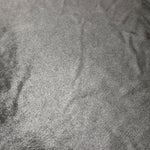 Silver Gray foiled stretch fabric texture close-up, displaying metallic reflection and fine surface character for apparel design