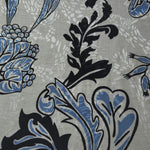 Blue sketch floral linen-look jacquard fabric pattern overview with tonal flower and branch motif.