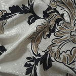 Brown sketch floral linen-look jacquard fabric draped to show soft structure and floral pattern depth.