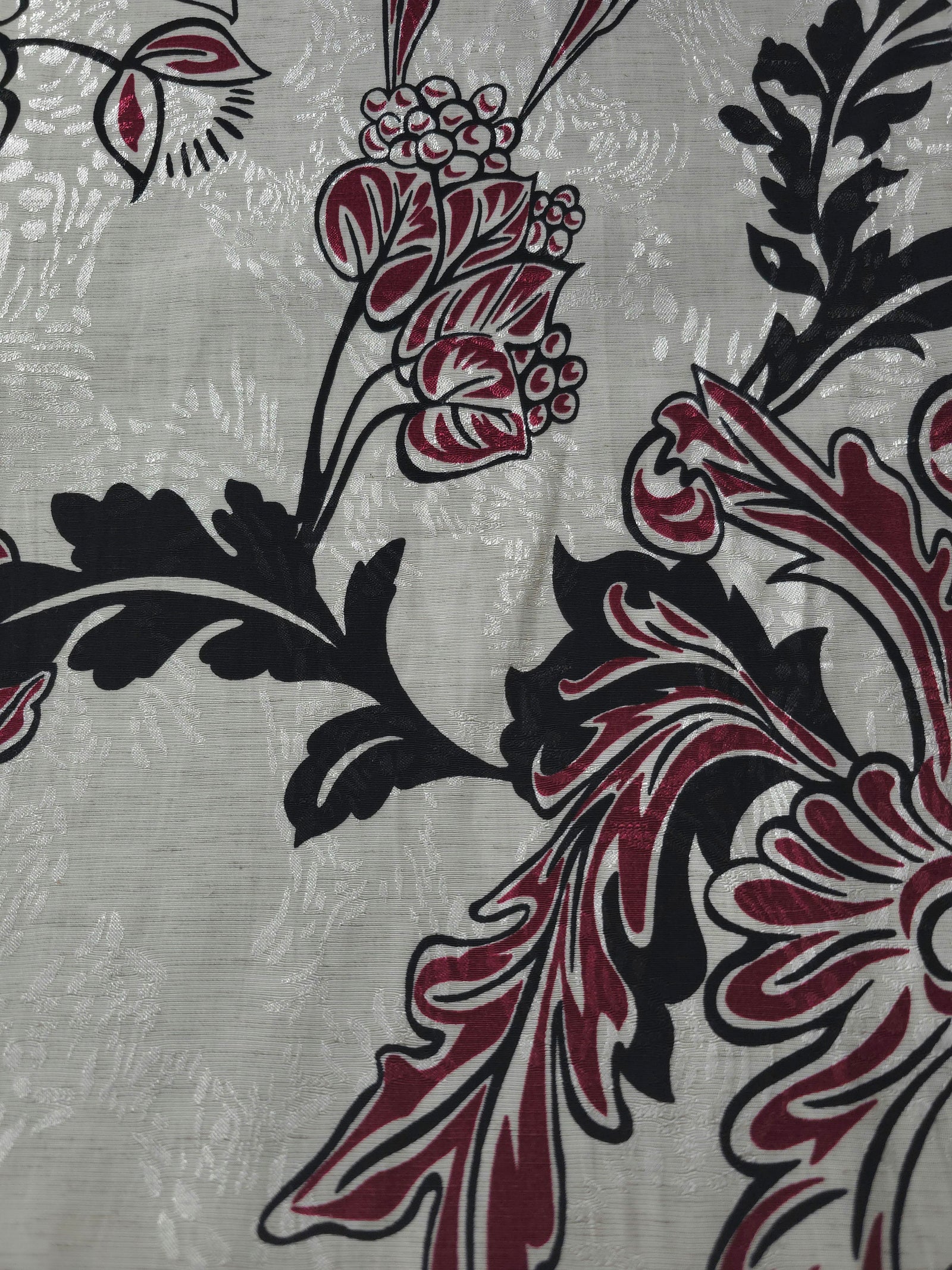Deep red sketch floral linen-look jacquard fabric pattern overview with tonal flower motif.