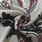 Deep red sketch floral linen-look jacquard fabric folded view showing soft structure and texture.