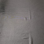 Smoky Gray shimmer metallic foiled spandex shown flat, displaying reflective finish for dance costumes, skirts and event apparel
