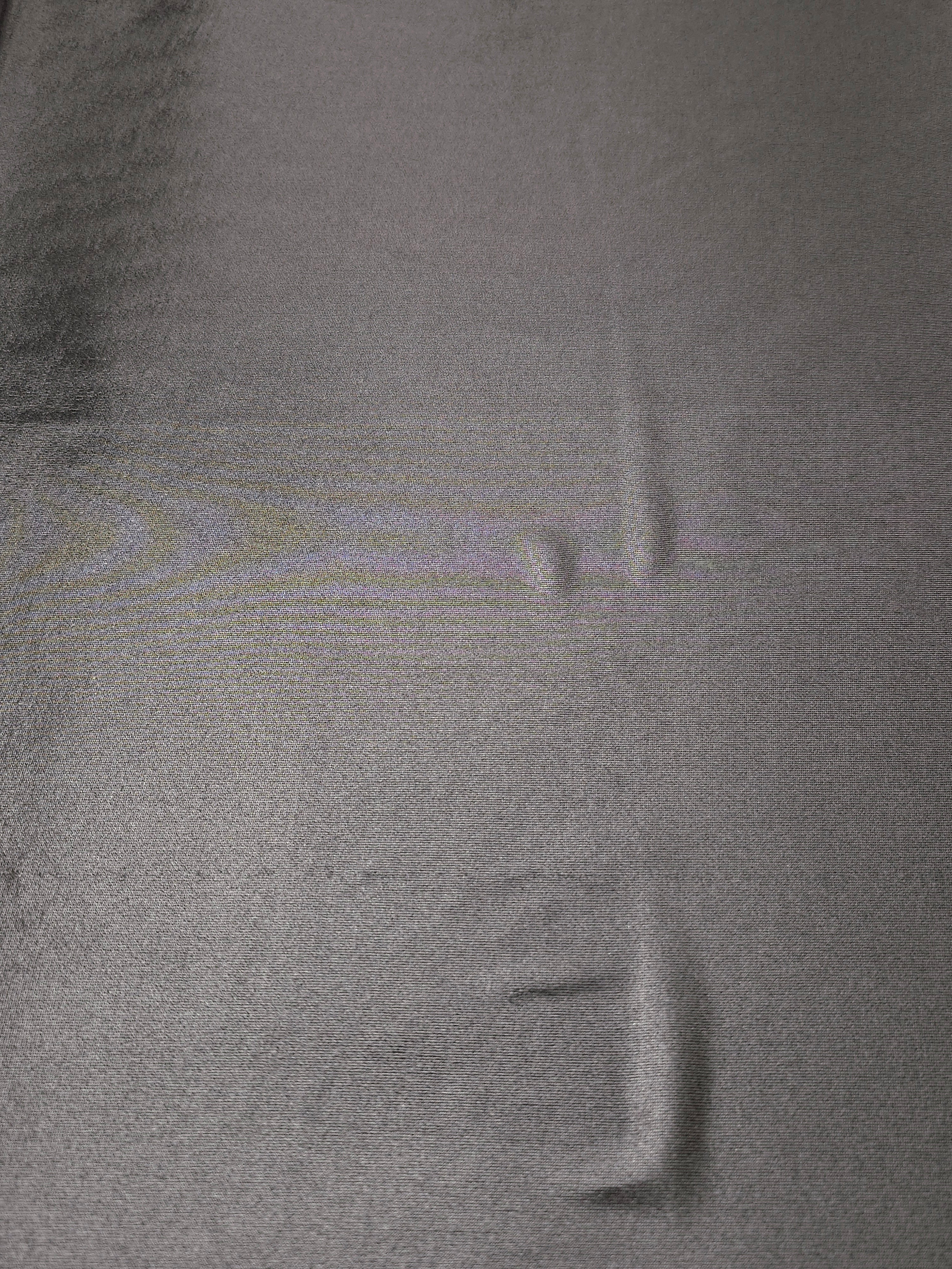 Smoky Gray shimmer metallic foiled spandex shown flat, displaying reflective finish for dance costumes, skirts and event apparel