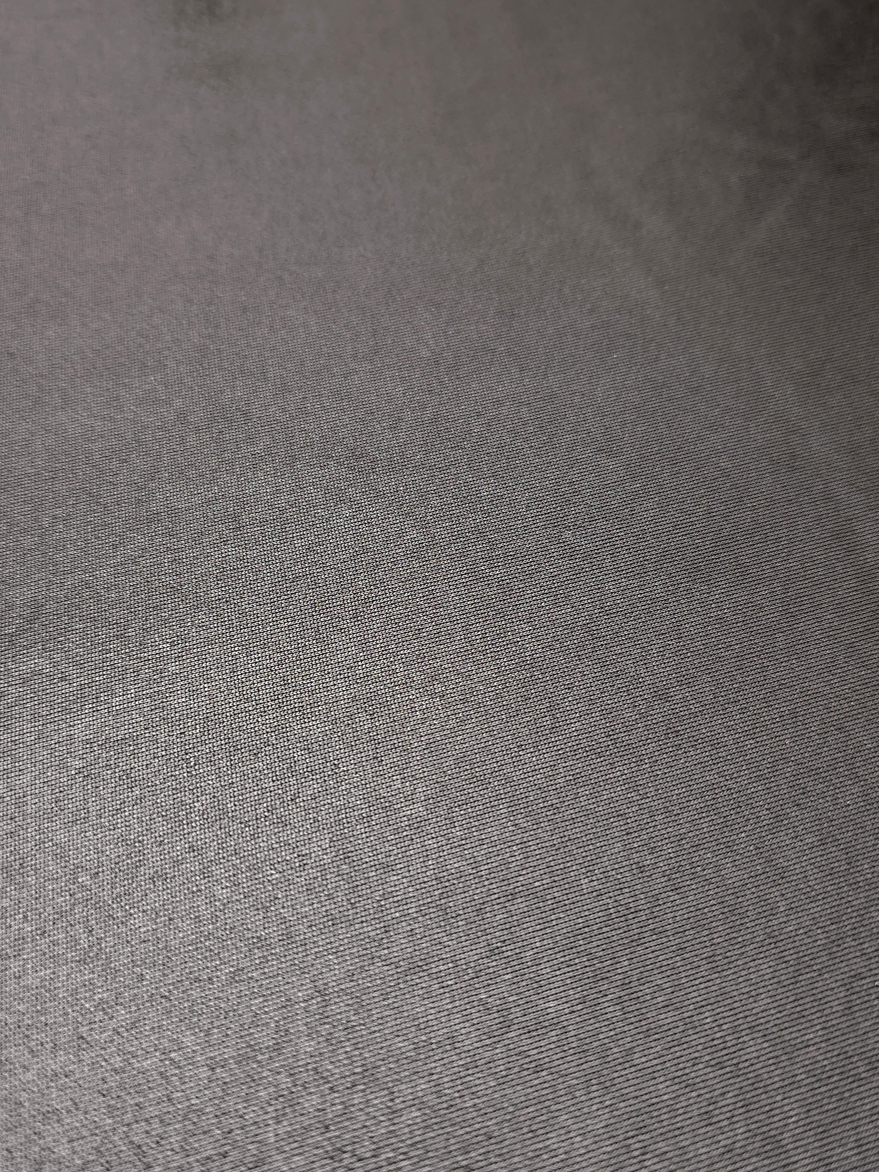 Close-up Smoky Gray shimmer metallic spandex showing reflective foil detail and the fabric surface for statement garments