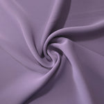 Flowing swirl of Smoky Lavender Korean polyester crepe showing soft drape for blouses, dresses and abayas