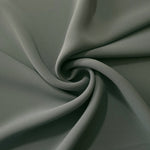 Swirled Smoky Sage Green Korean crepe showing fluid movement and silky drape for dresses and occasionwear