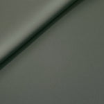 Soft fold of Smoky Sage Green opaque polyester crepe showing fluid dressmaking drape for dresses and skirts