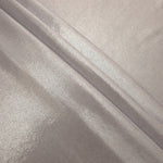 Layered Soft Silver Gray shimmer stretch fabric showing metallic foil depth and soft structure for costumes, skirts and fashion apparel
