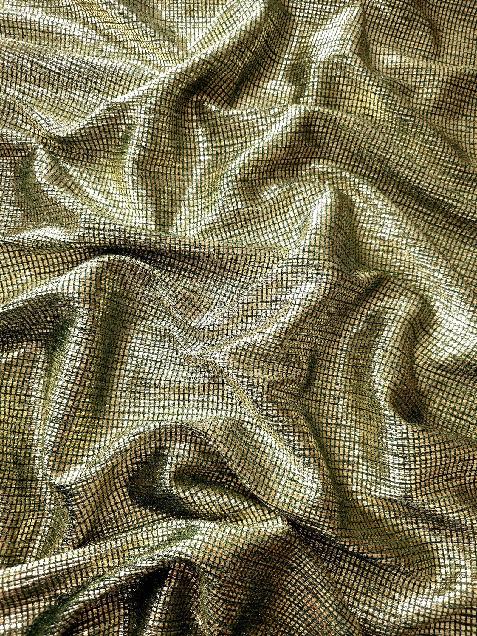 Draped Antique Gold Sheer Square Shimmer Stretch Tulle Fabric showing a geometric reflective grid across fluid folds