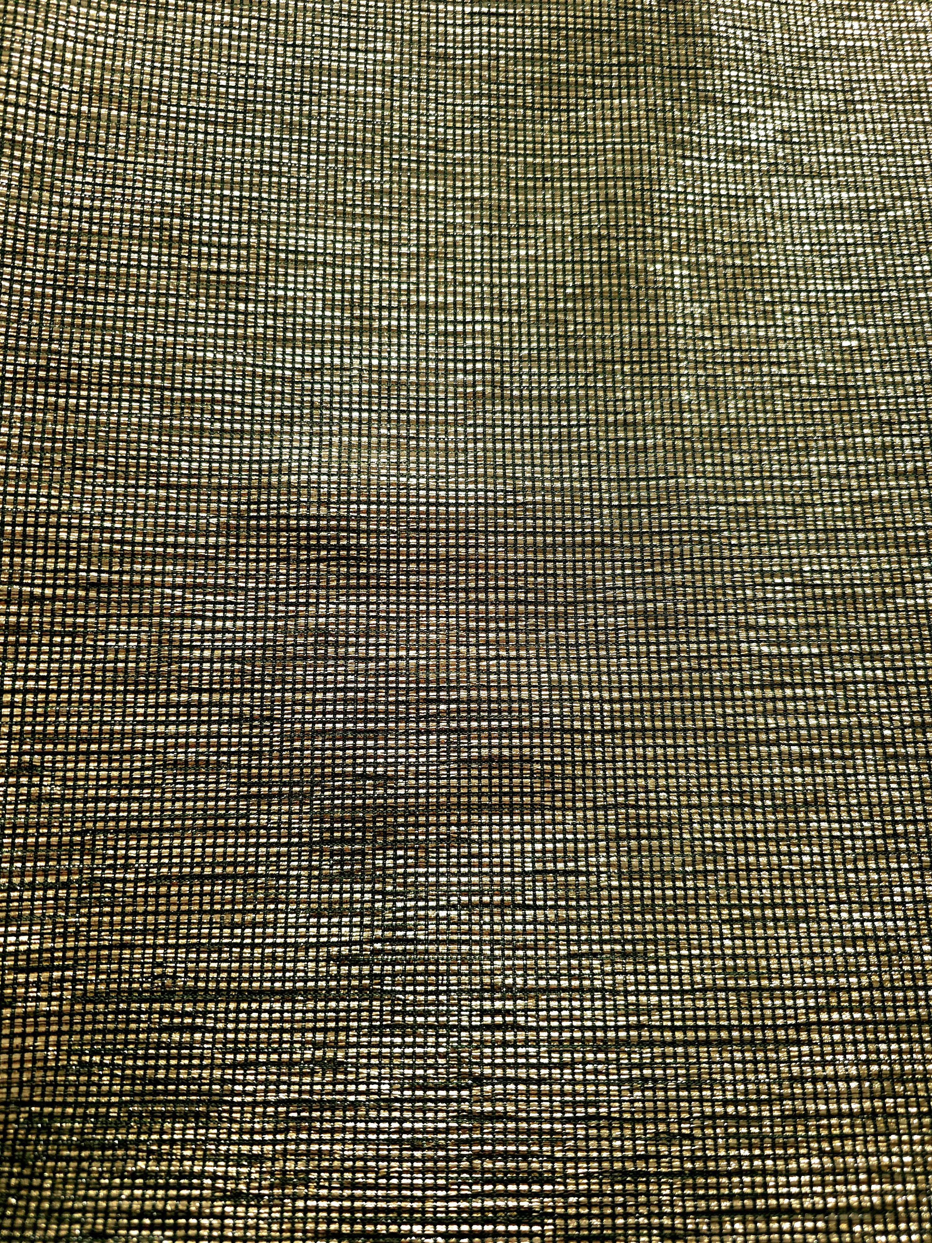 Surface detail of Antique Gold Sheer Square Shimmer Stretch Tulle Fabric highlighting square grid scale and lightweight tulle texture