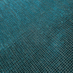 Close-up of Aqua Teal Sheer Square Shimmer Stretch Tulle Fabric revealing the square shimmer repeat and fine transparent mesh