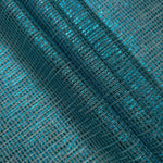 Layered Aqua Teal Sheer Square Shimmer Stretch Tulle Fabric showing overlapping geometry, denser shimmer and translucent depth