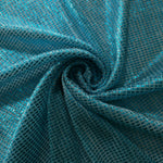 Swirl-draped Aqua Teal Sheer Square Shimmer Stretch Tulle Fabric showing structured square reflections moving through soft folds